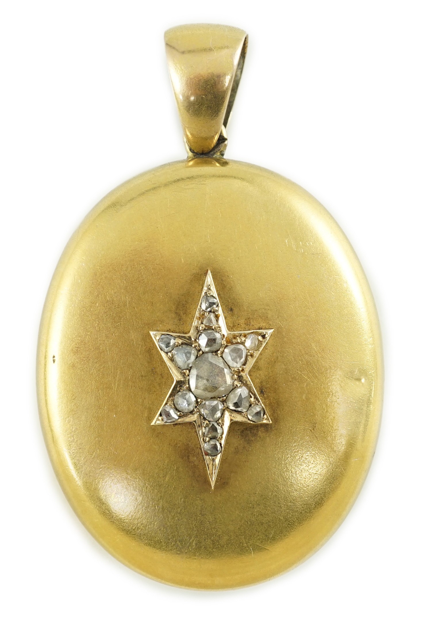 A Victorian gold and rose cut diamond set oval pendant locket